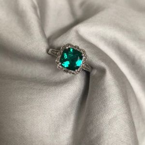 Manufactured emerald and sterling silver ring.